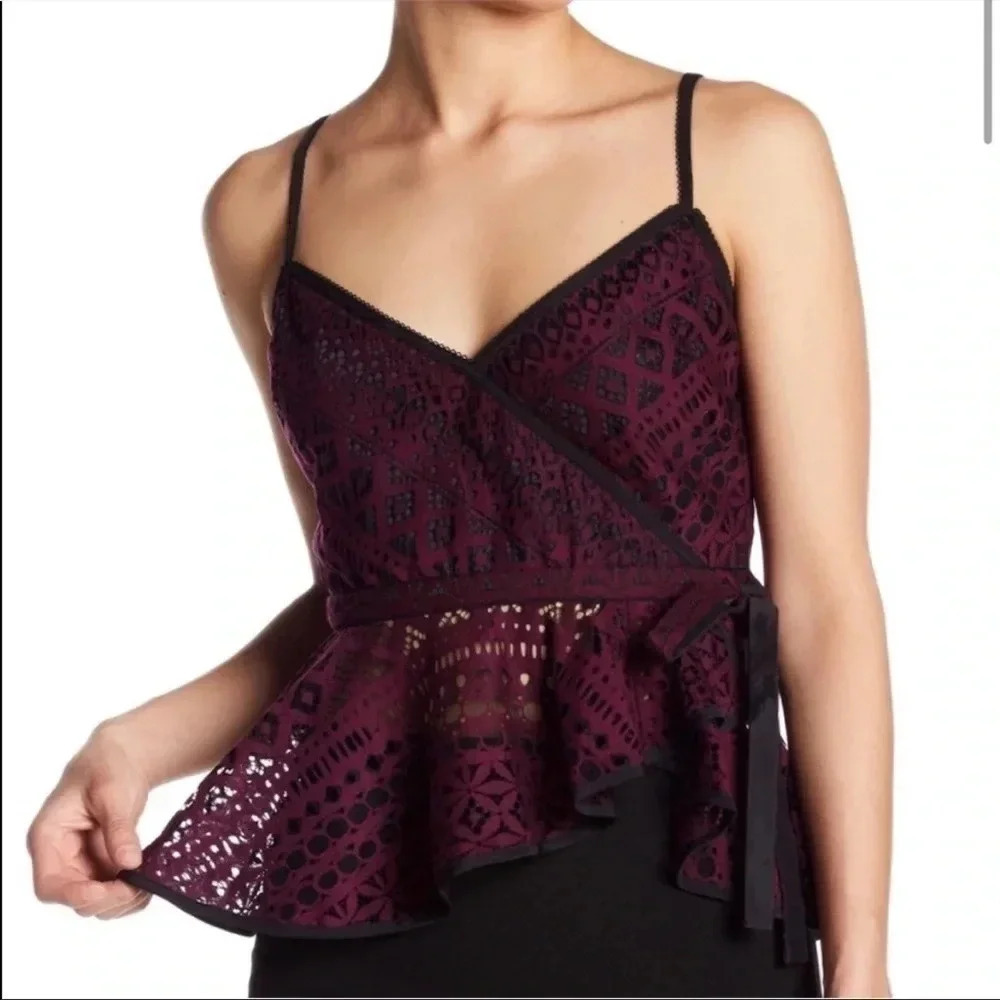 Likely Larson laced  top